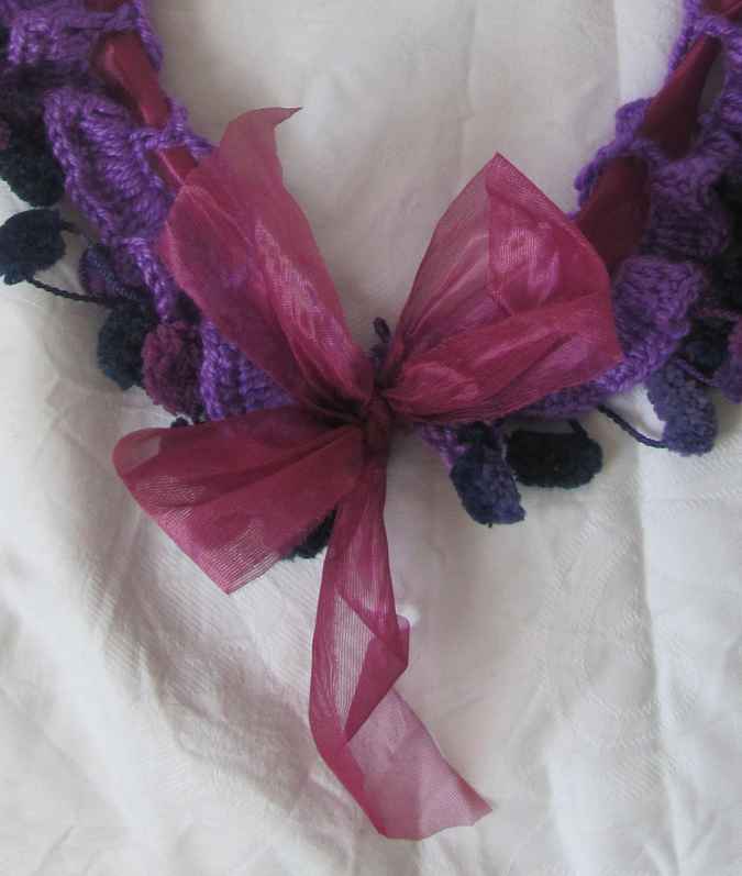 large image of art item: accessory &ndash; crochet purple ponpons ribbon