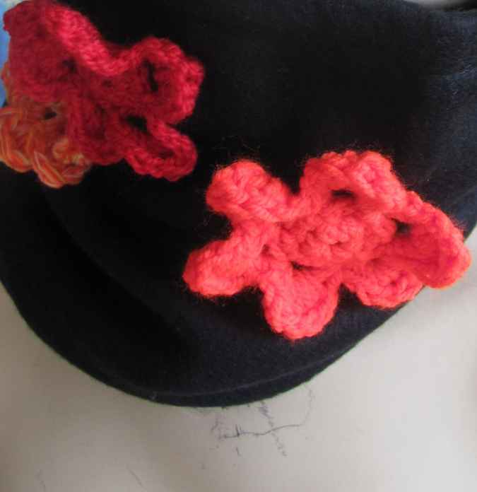 large image of art item: accessory &ndash; black hat/scarf with red crochet flowers
