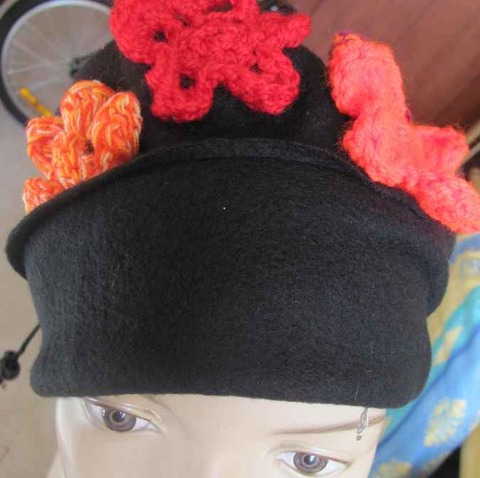 large image of art item: accessory &ndash; black hat/scarf with red crochet flowers