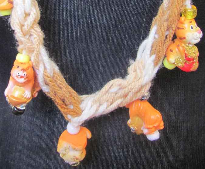 large image of art item: accessory &ndash; necklace crochet orange white flower animals wooden