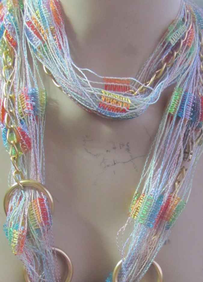 large image of art item: accessory &ndash; necklace rings golden threads colorful