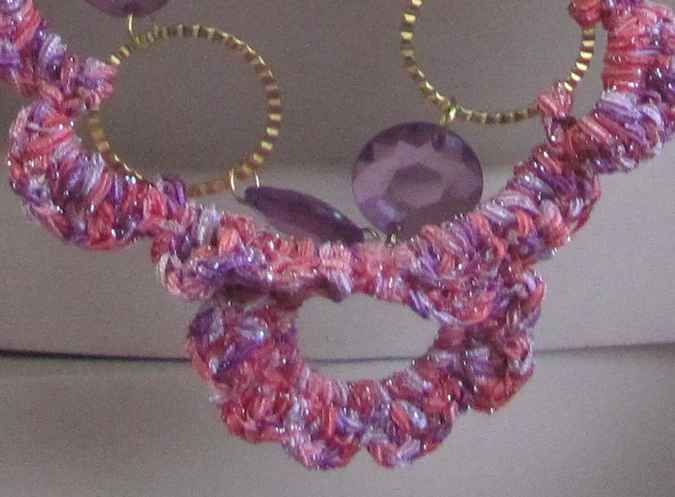 large image of art item: accessory &ndash; chestpiece necklace crochet pink rings gold