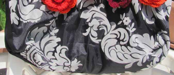large image of art item: bag &ndash; black motif plant white flower crochet red