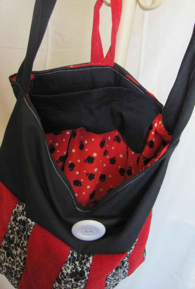 large image of art item: bag &ndash; black stripes red black button white