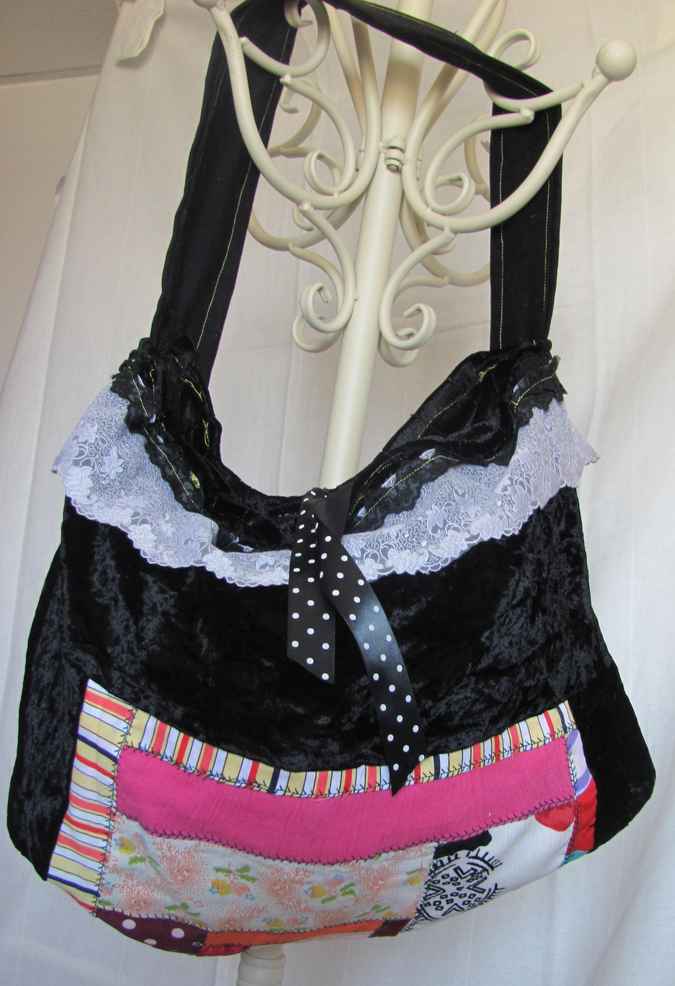 large image of art item: bag &ndash; black with white lace pink quiltwork and black and white ribbon