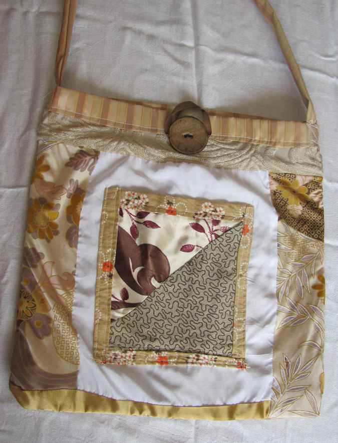 large image of art item: bag &ndash; button brown quiltwork