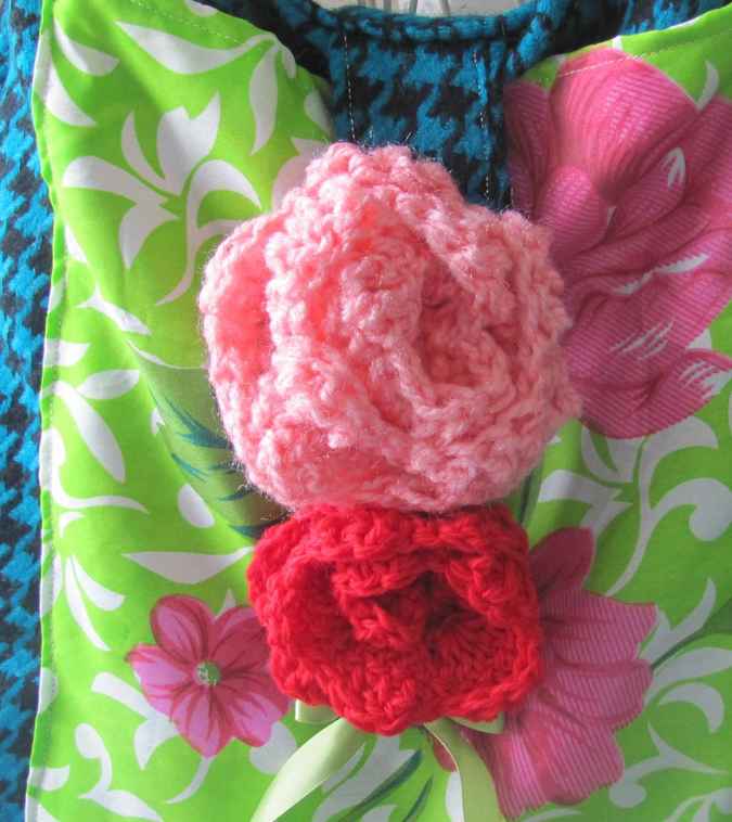 large image of art item: bag &ndash; checkred blue black motif leaves green white crochet flowers red pink