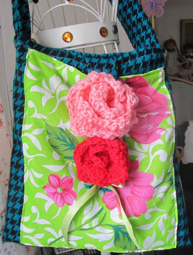 large image of art item: bag &ndash; checkred blue black motif leaves green white crochet flowers red pink