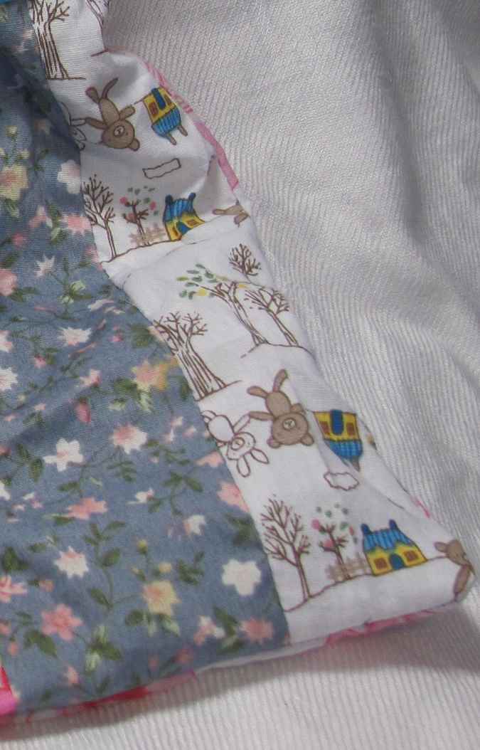 large image of art item: bag &ndash; doll and blue ribbon