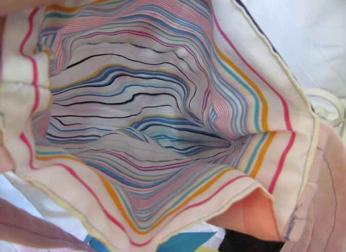 large image of art item: bag &ndash; doll and blue ribbon