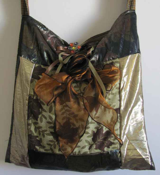 large image of art item: bag &ndash; gold with ribbons