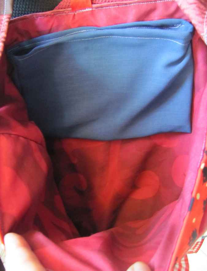 large image of art item: bag &ndash; quiltwork red blue with red ribbons