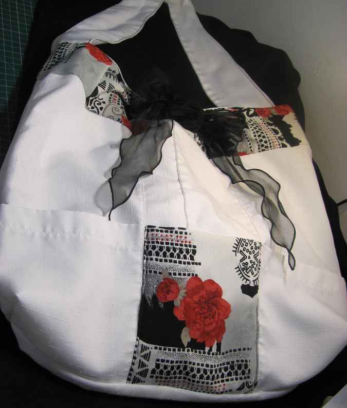 large image of art item: bag &ndash; white flower red ribbon black