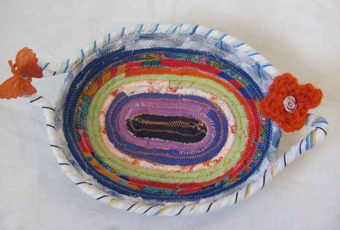 large image of art item: basket &ndash; small purple green blue with orange butterfly and flower
