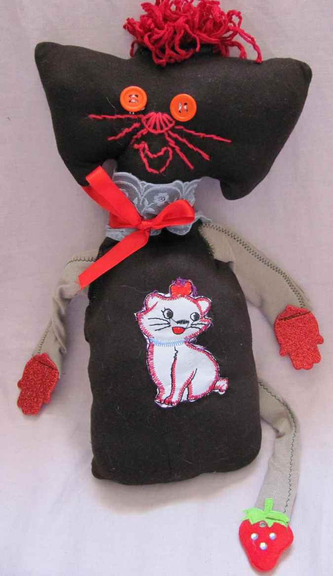 large image of art item: doll &ndash; cat and dog quilt