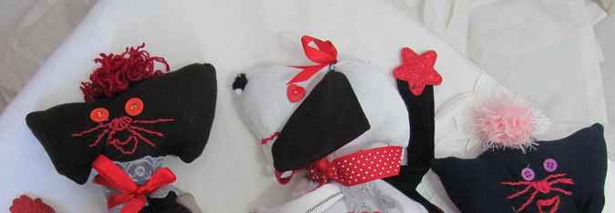 large image of art item: doll &ndash; cat and dog quilt