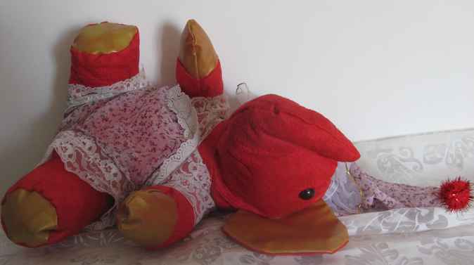 large image of art item: doll &ndash; elephant red gold