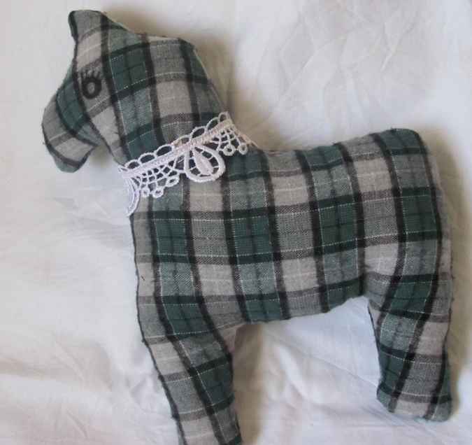 large image of art item: doll &ndash; horse checkered