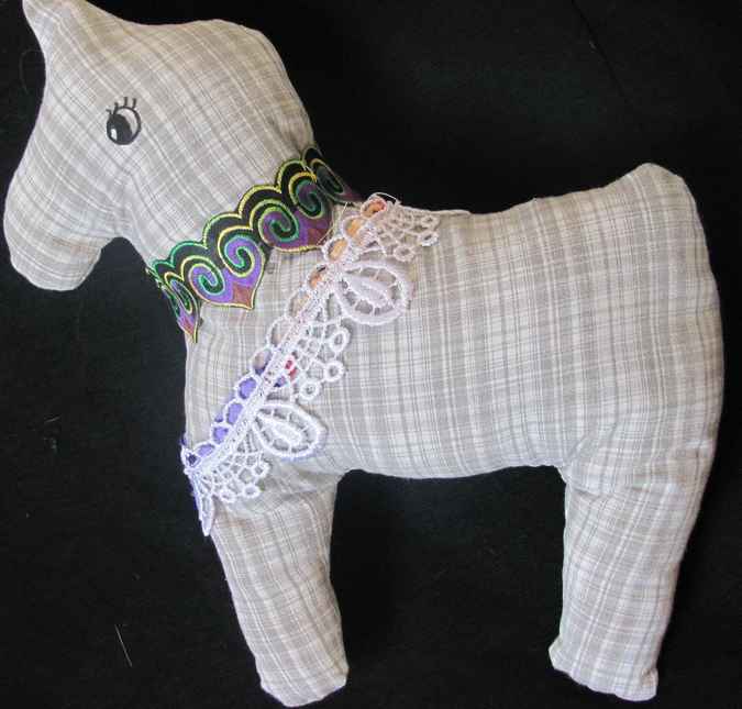 large image of art item: doll &ndash; horse checkered