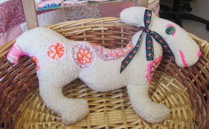 large image of art item: doll &ndash; horsy with flowers