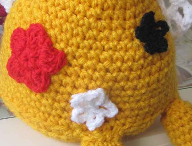 large image of art item: doll &ndash; rooster with flowers