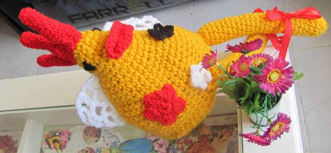 large image of art item: doll &ndash; rooster with flowers