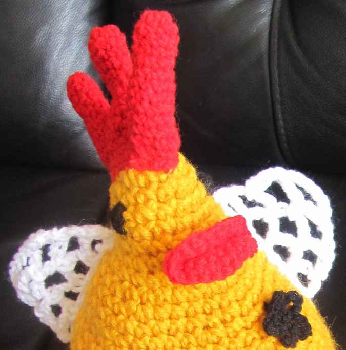 large image of art item: doll &ndash; rooster with flowers