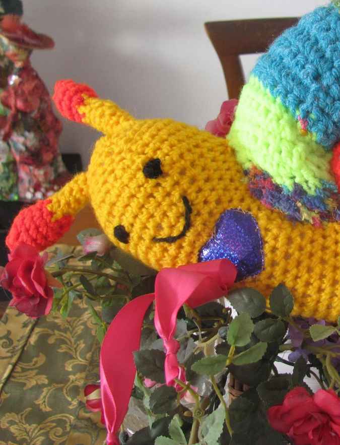 large image of art item: doll &ndash; snail crochet