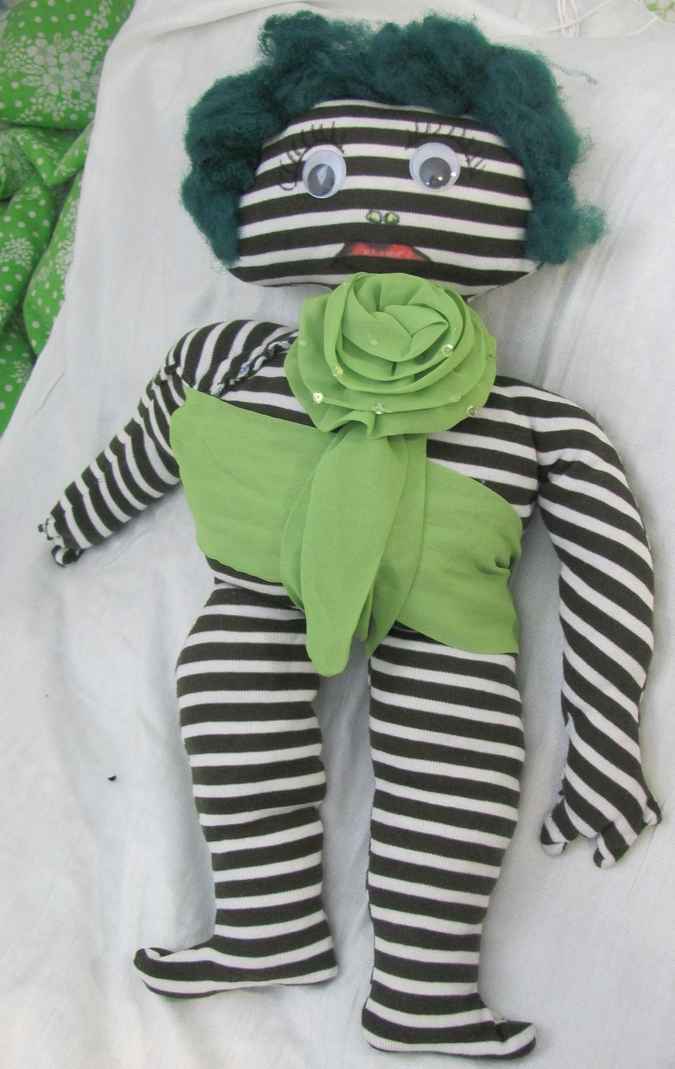 large image of art item: doll &ndash; striped quilt