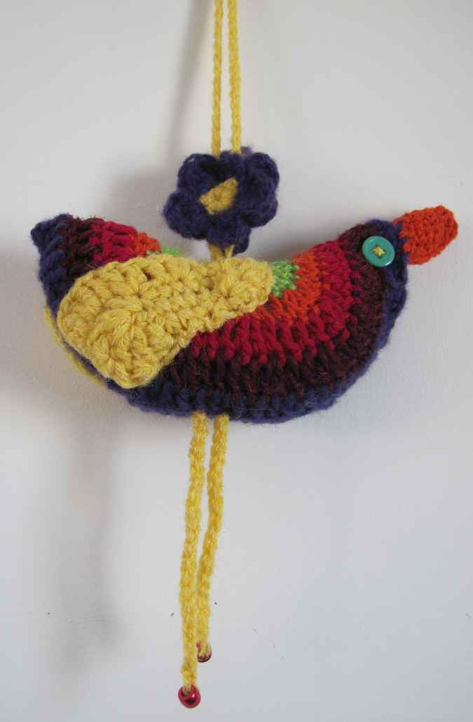 large image of art item: decor &ndash; bird crochet yellow red black
