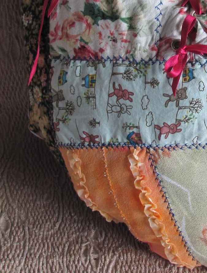 large image of art item: heart shaped quilted pillow with ribbon